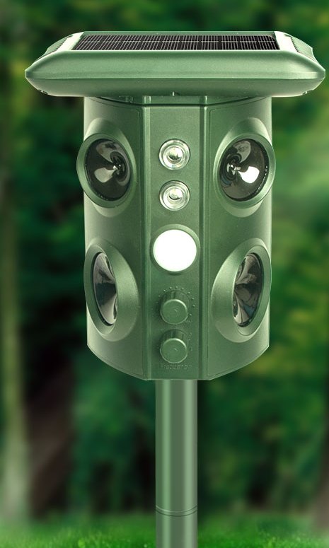 The QuietYard repeller standing in a forest garden